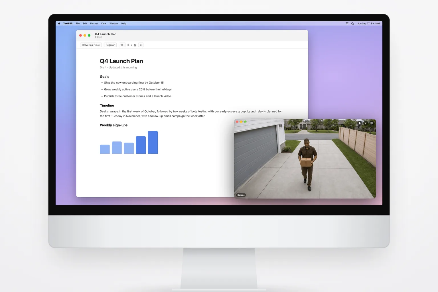 An iMac with a document open and the Ring Garage camera floating over it in its own window, showing a delivery driver walking up the driveway