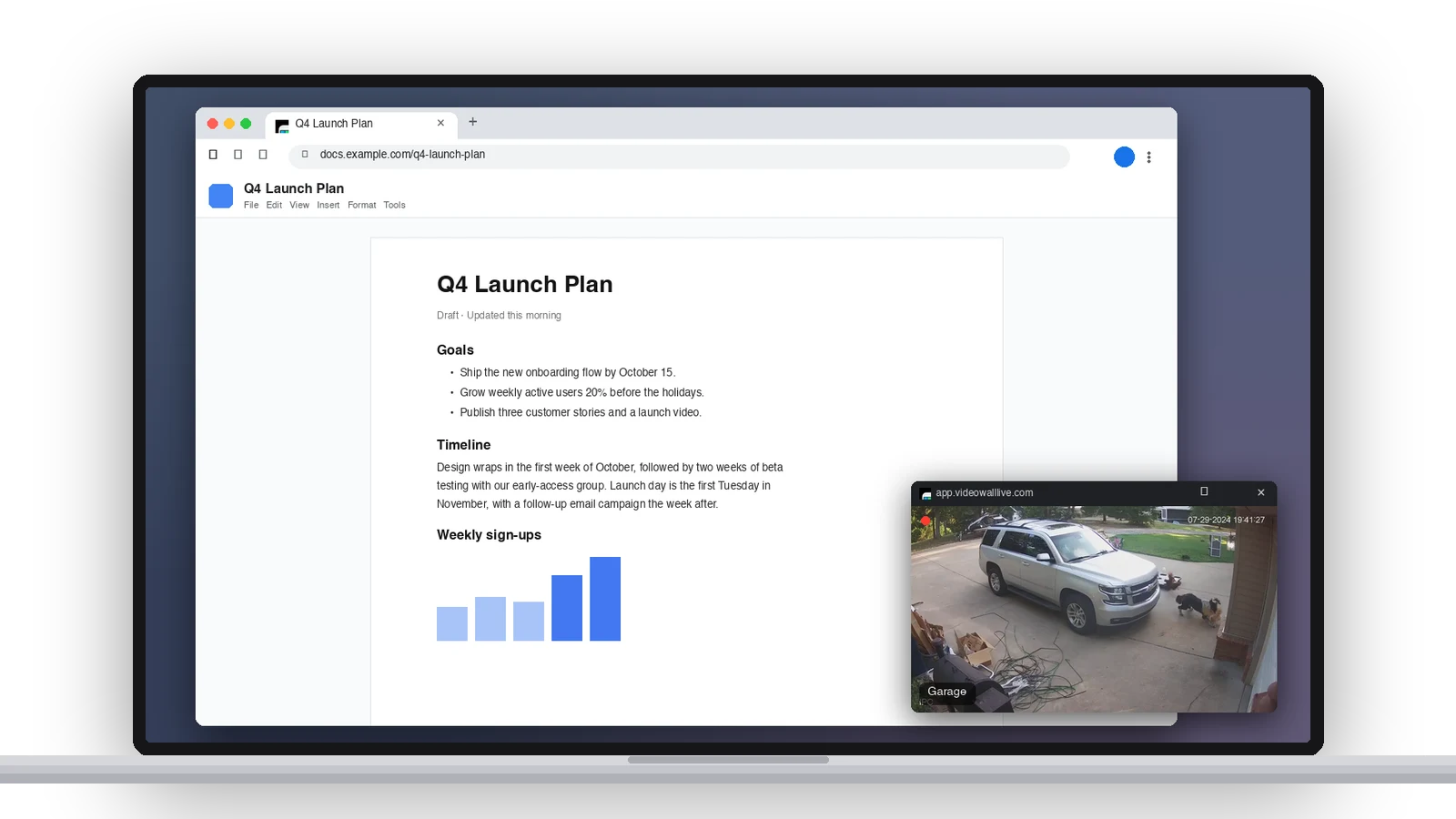 A laptop with a document open in the browser and the Ring Garage camera floating over it in a small always-on-top window
