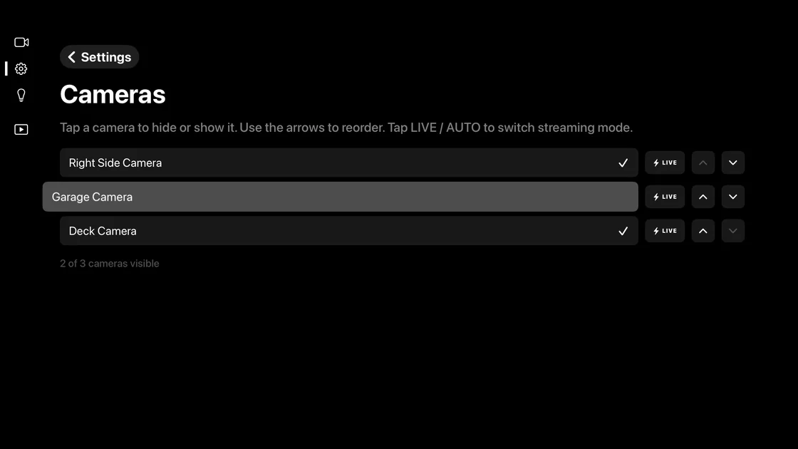 Video Wall's Cameras settings screen with Garage Camera unchecked and 2 of 3 cameras visible