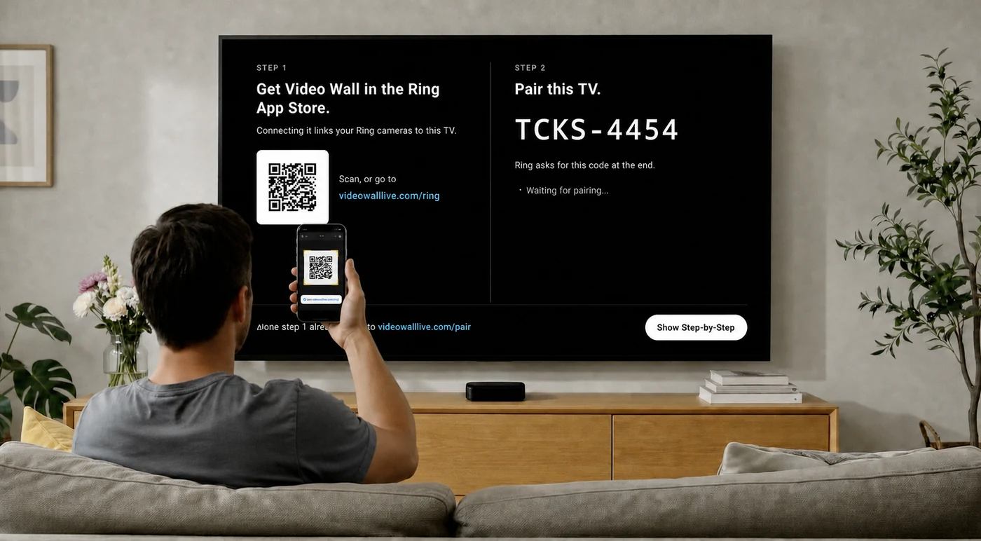 Video Wall pairing screen on a Fire TV: a QR code and videowalllive.com/ring on the left, an 8-character pairing code on the right, and a phone scanning the code