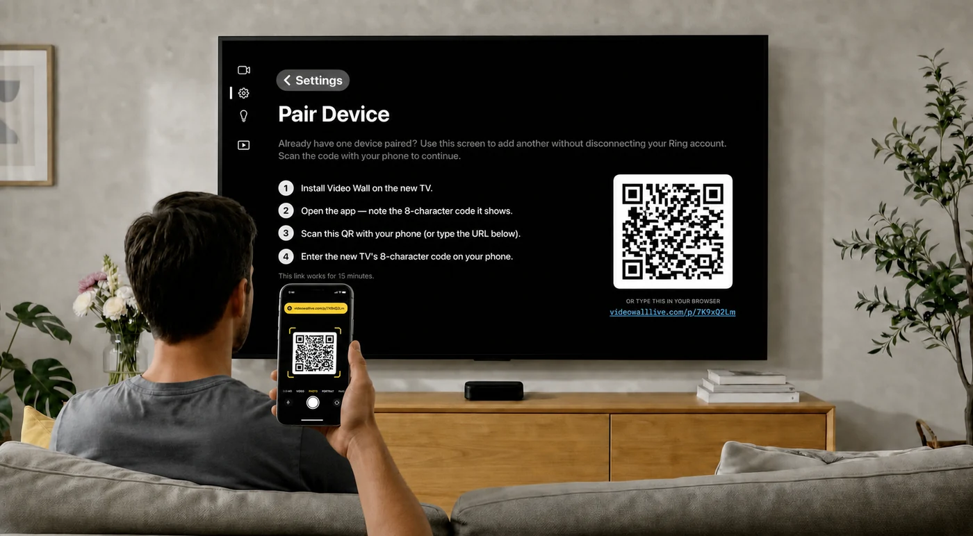 The Pair Device screen on a TV, showing a QR code and a short link, with a phone scanning it