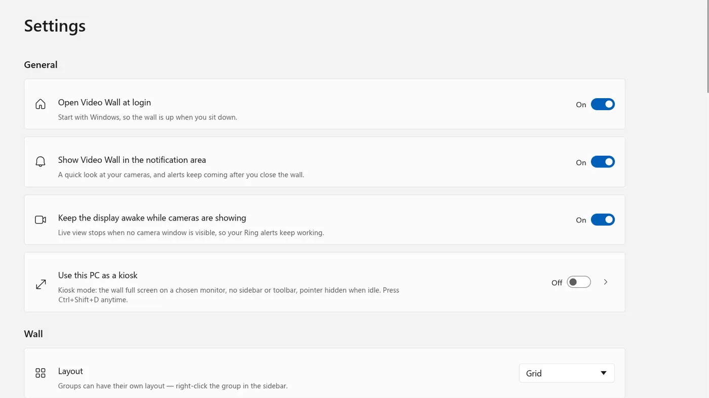 Settings in the Windows app, General section: Open Video Wall at login, Show Video Wall in the notification area, Keep the display awake while cameras are showing, and Use this PC as a kiosk